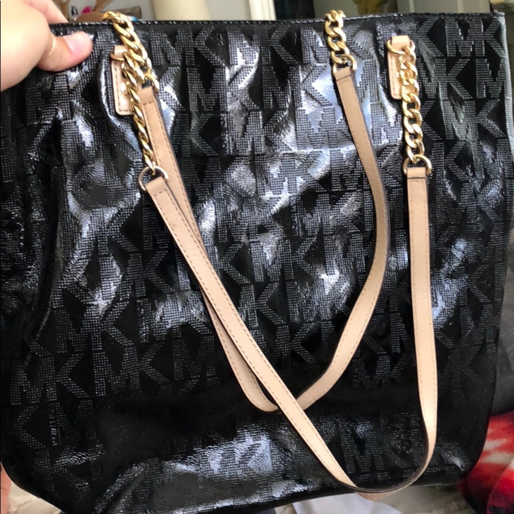 Gloss finished Michael Korda bag